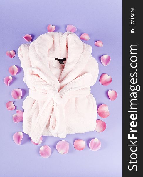 Pink Bathrobe Surrounded With Rose Pedals