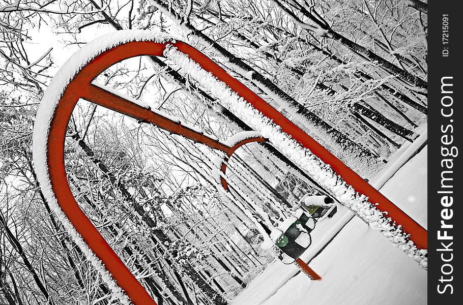 Empty Swing on wintery playground. Empty Swing on wintery playground