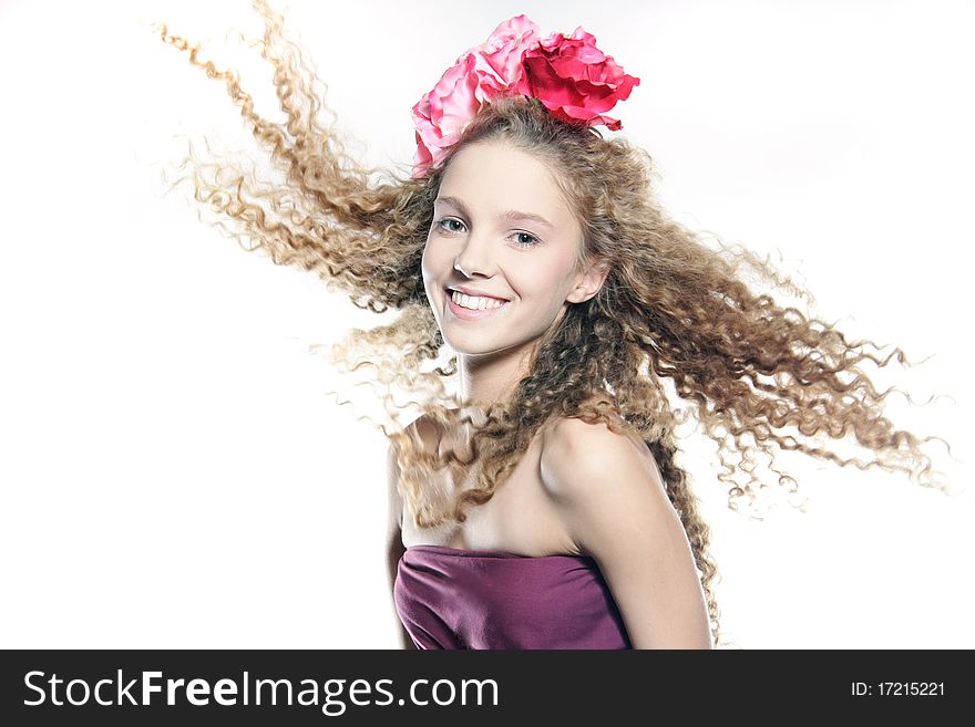 Studio portrait of young happy woman over white