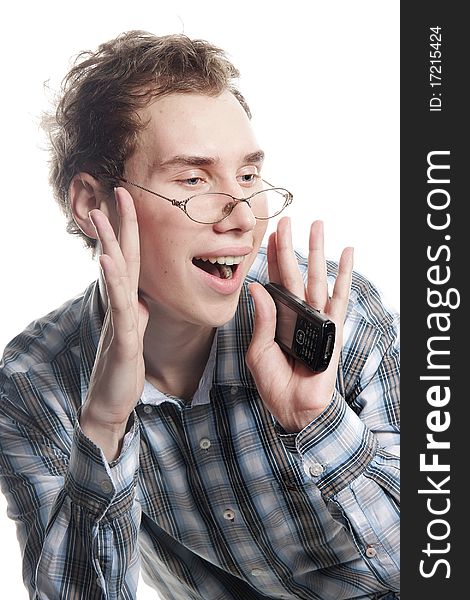 Studio portrait of young handsome man with phone over white