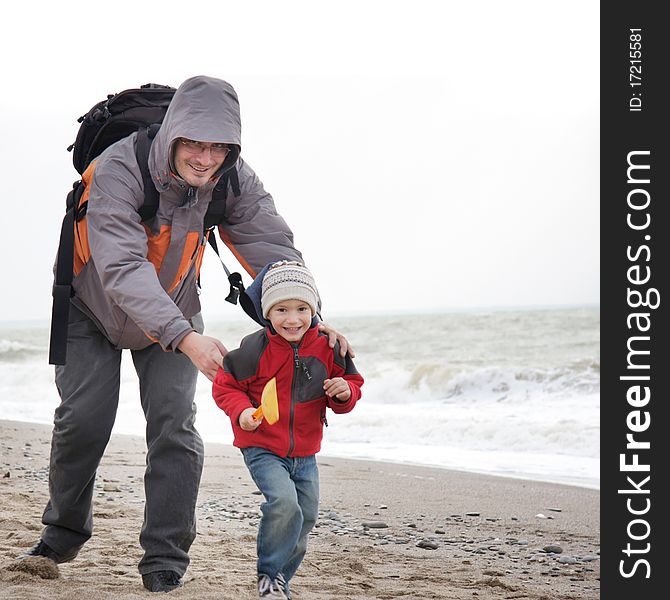 Father and son on beach