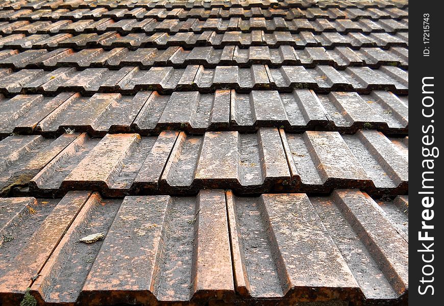 Background of old tiles on a roof