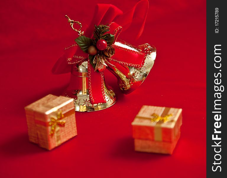Christmas decoration with bell   on red background . Christmas decoration with bell   on red background .