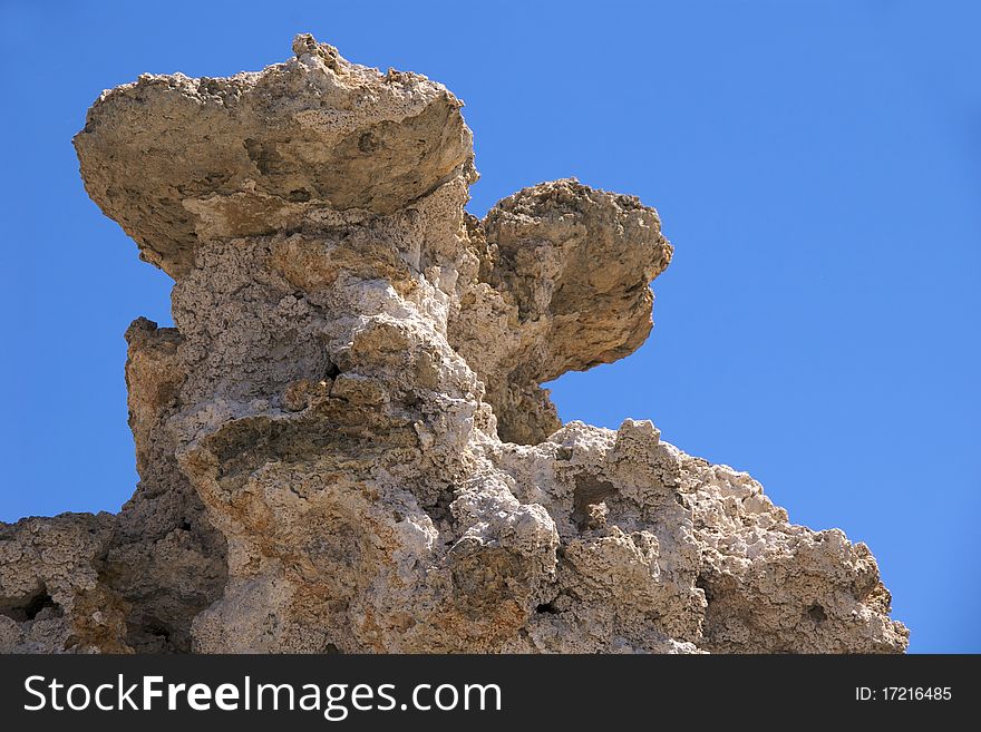 Closeup of tufa tower against blue sky, Mono Lake Tufa State Nature Reserve, near Lee Vining, CA