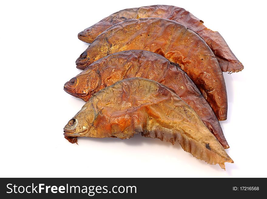 Dried fishes on white background.