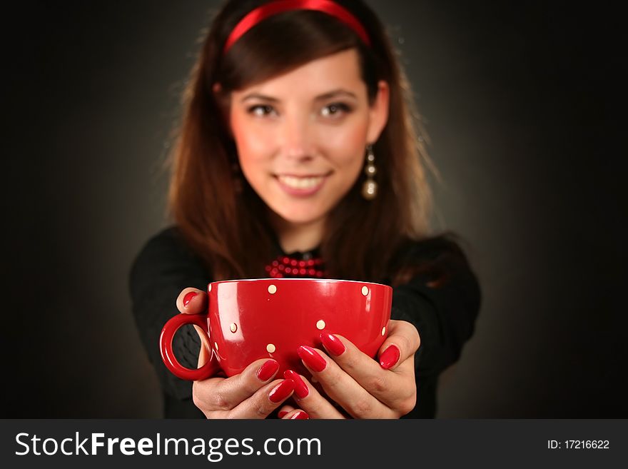 Beautiful retro woman with red cup. Beautiful retro woman with red cup