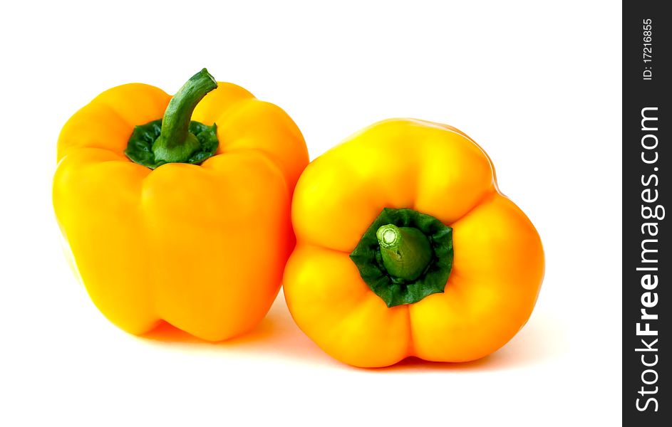 Fresh healthy yellow bell peppers isolated on white. Fresh healthy yellow bell peppers isolated on white