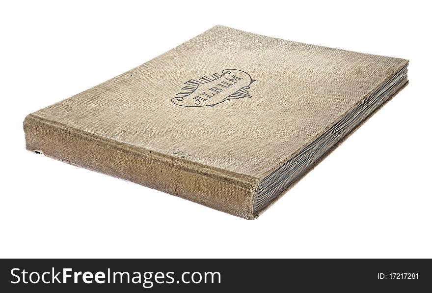 Old worn photograph album isolated against a white background