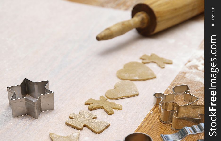 Baking christmas cookies on a table. Baking christmas cookies on a table