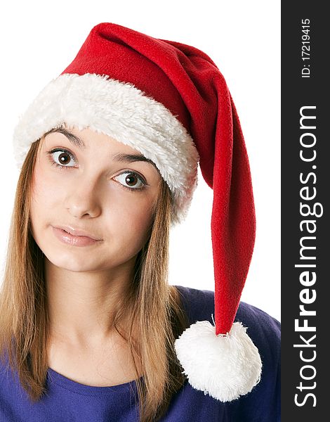 Beautiful girl in red Santa hat on a white background