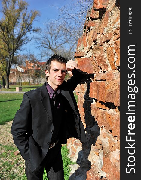 Portrait of an happy young attractive man in the park. Portrait of an happy young attractive man in the park