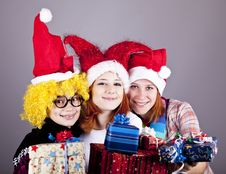 Three Girlfriends In Funny Hats Royalty Free Stock Photography