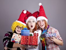 Three Girlfriends In Funny Hats Royalty Free Stock Images