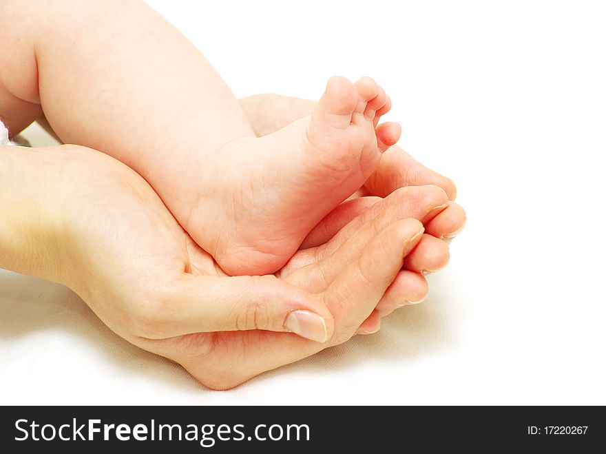 Newborn baby feet isolated on white