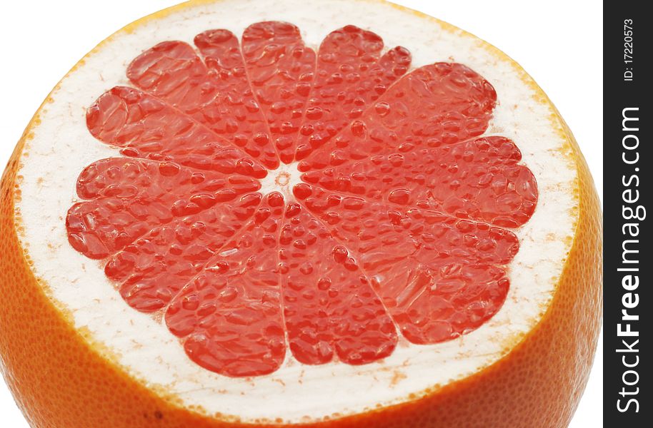 Cut red Grapefruit over white