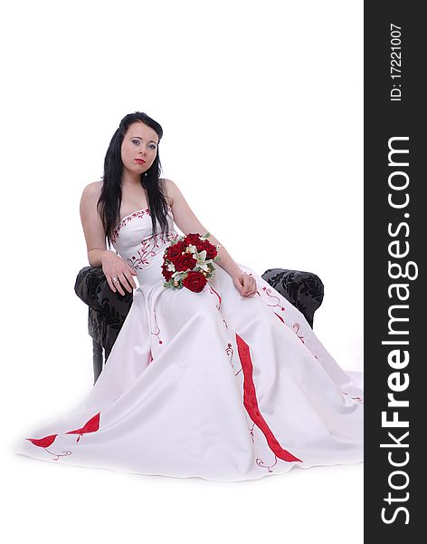 Cute young bride in white and red wedding dress