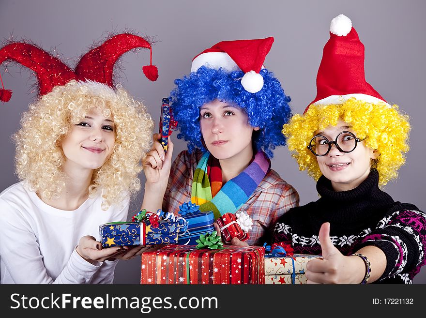 Three girlfriends in funny hats