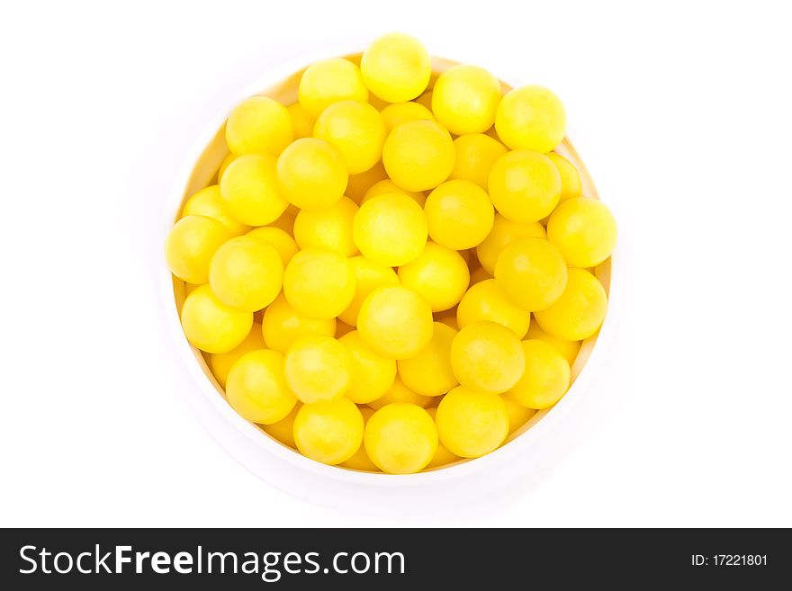 Pile of vitamin pills across white