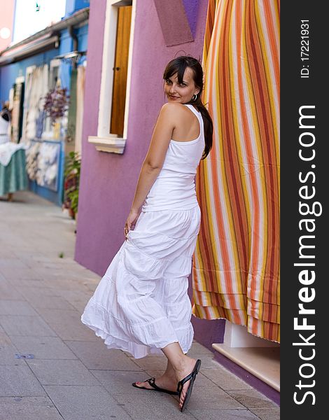 Portrait of a beautiful young woman in Venice. This image is shot with selective focus, processed from 16-bit Pro rgb. Portrait of a beautiful young woman in Venice. This image is shot with selective focus, processed from 16-bit Pro rgb.