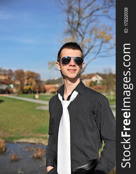 Portrait of an attractive man in the park. Portrait of an attractive man in the park