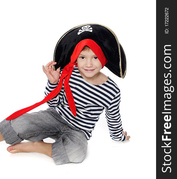 Studio portrait of young boy dressed as pirate