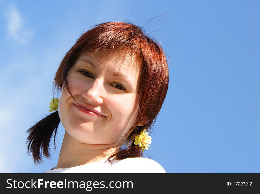 Pretty smiling woman on sky background. Pretty smiling woman on sky background