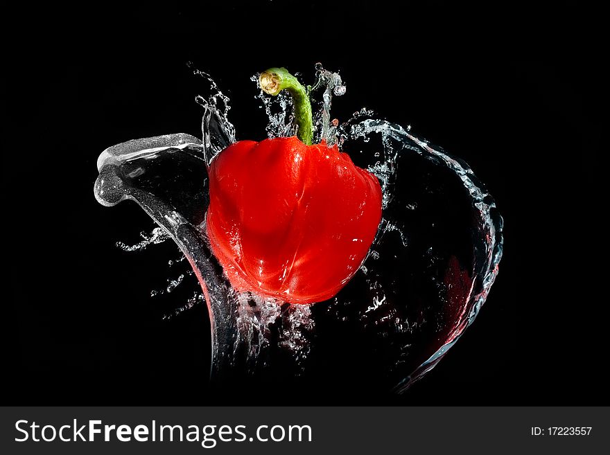Red pepper splash in water. Red pepper splash in water