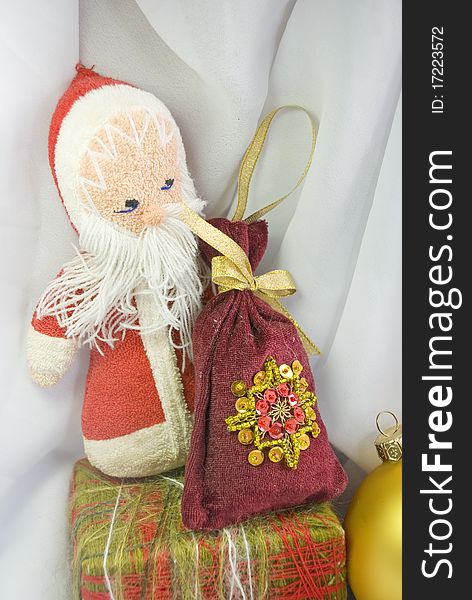 Old toy - Santa Claus with a bag of gifts