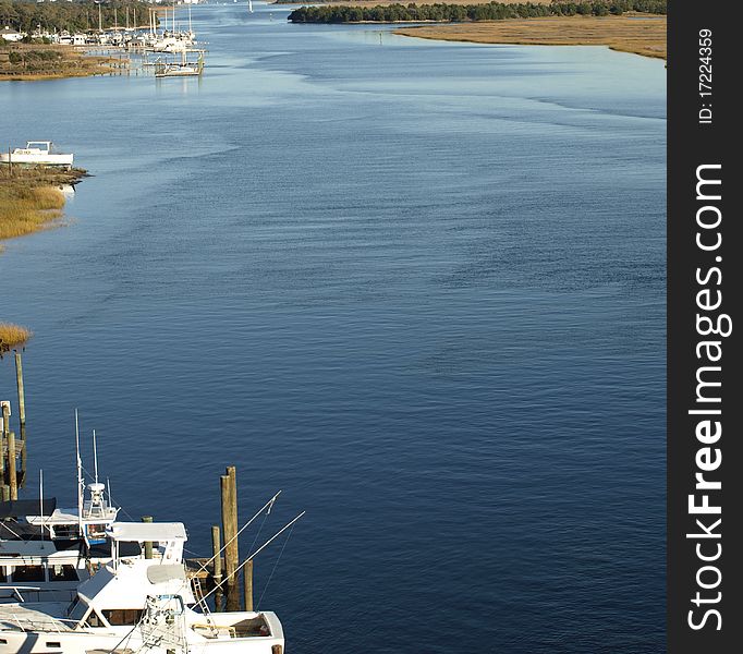 View of the boats along the intracoastal waterway from the Oak Osland Bridge. View of the boats along the intracoastal waterway from the Oak Osland Bridge