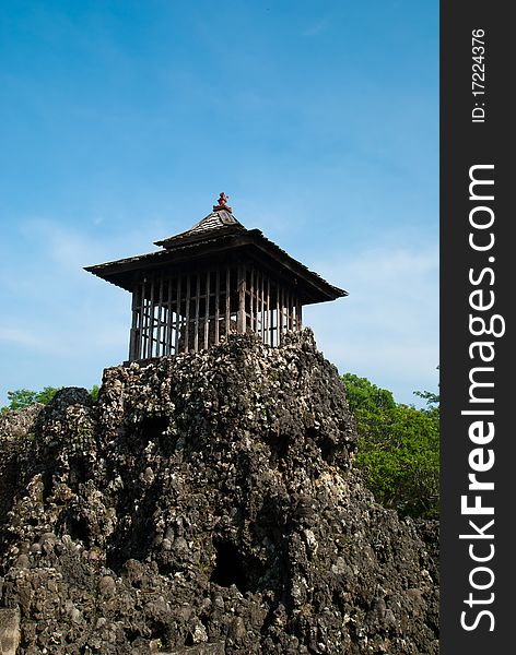 A unique rocky temple in portrait mode with blue sky