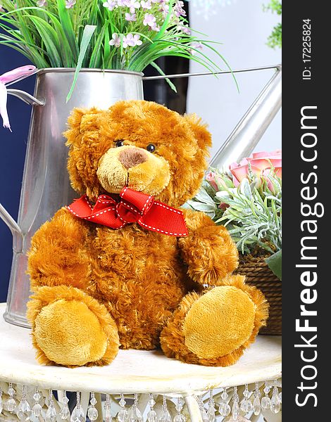 Teddy bear with a christmas background