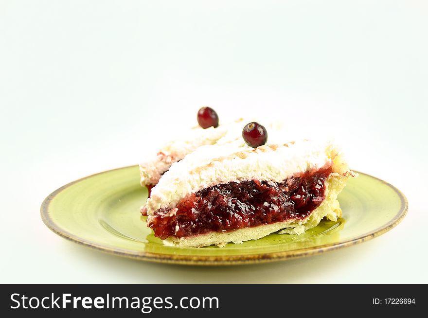 Two portion fruit pie on a plate