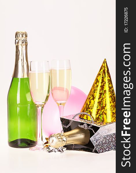 Champagne and party time on white background