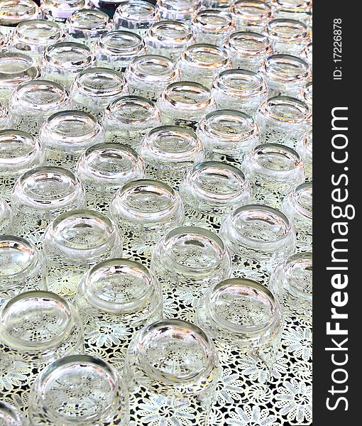 An abstract view of a collection of empty wine or drinking glasses. An abstract view of a collection of empty wine or drinking glasses