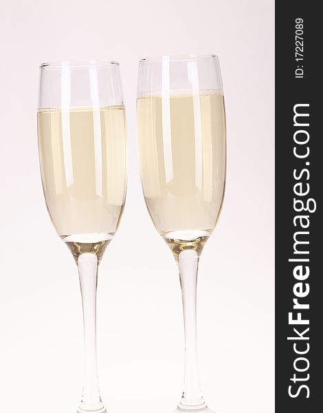 Champagne and party time on white background