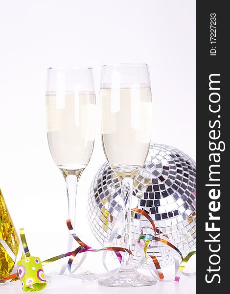 Champagne and party time on white background