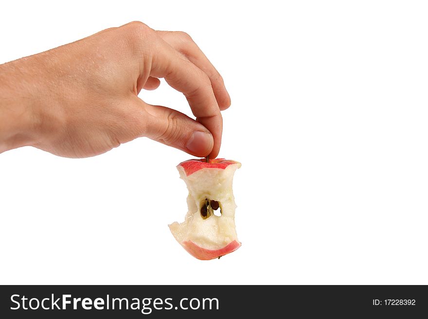 Hand hold apple core isolated on white background