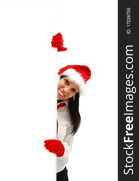 Female Santa with red hat and gloves behind a white billboard. Female Santa with red hat and gloves behind a white billboard