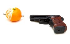 The Close Up Of A Pistol A Tangerine Royalty Free Stock Photography The Close Up Of A Pistol A Tangerine Royalty Free Stock Photography
