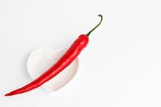 Red Hot Chili Pepper On Heart Shape Saucer Royalty Free Stock Image Red Hot Chili Pepper On Heart Shape Saucer Royalty Free Stock Image