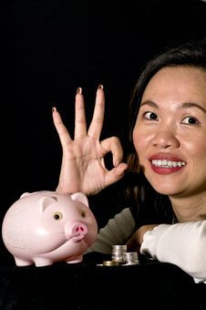 Young Woman With Pink Piggy Bank Stock Image