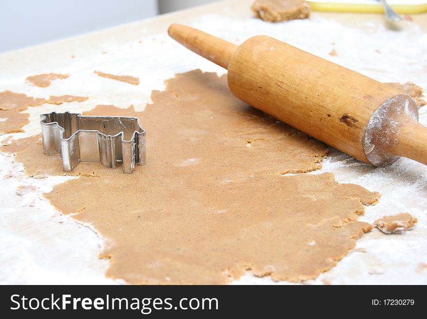 Baking gingerbread - batter, metal form and rolling-pin