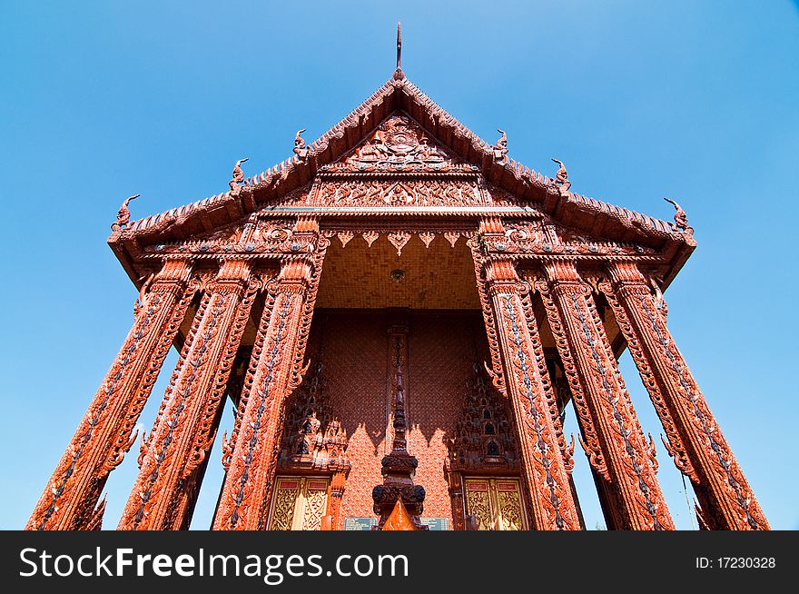 Front view of terra-cotta church at temple, Thailand.