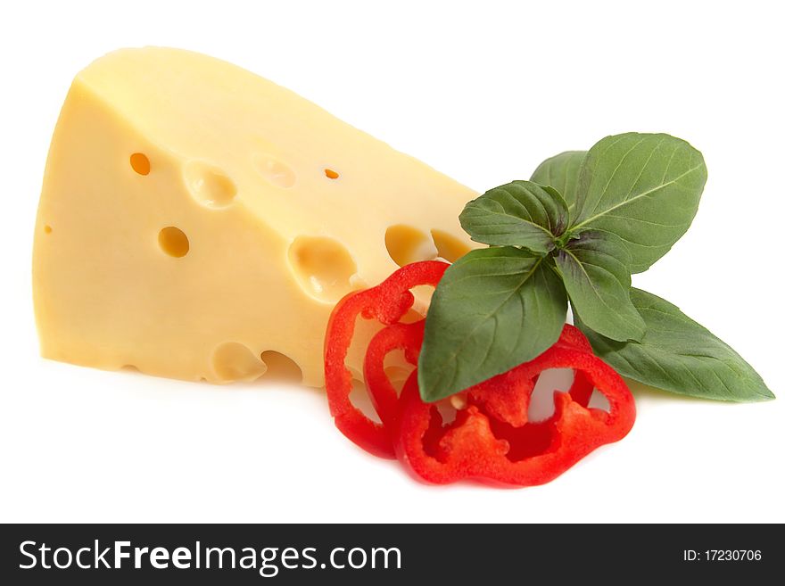Delicious cheese, red pepper and basil on white background. Delicious cheese, red pepper and basil on white background