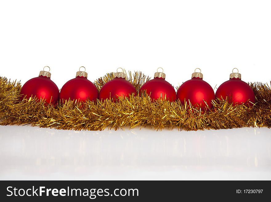 Lined up Christmas evening balls in golden Christmas decoration