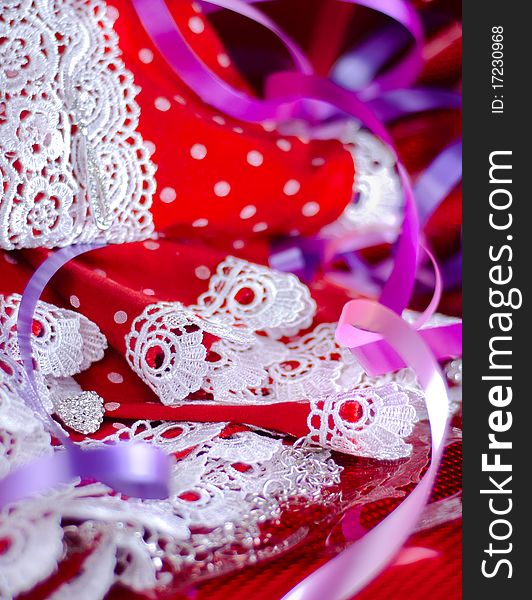 Red Christmas background with lace and serpentine