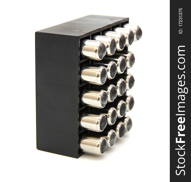 The 9-millimetric chromeplated cartridges of a pistol in shop. The 9-millimetric chromeplated cartridges of a pistol in shop