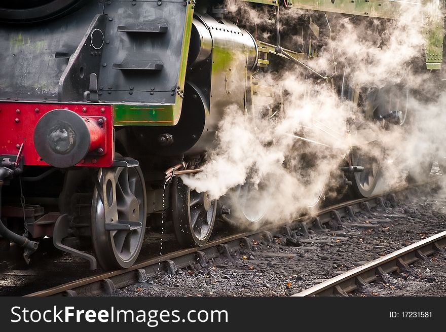 Steam release from a vintage locomotive. Steam release from a vintage locomotive