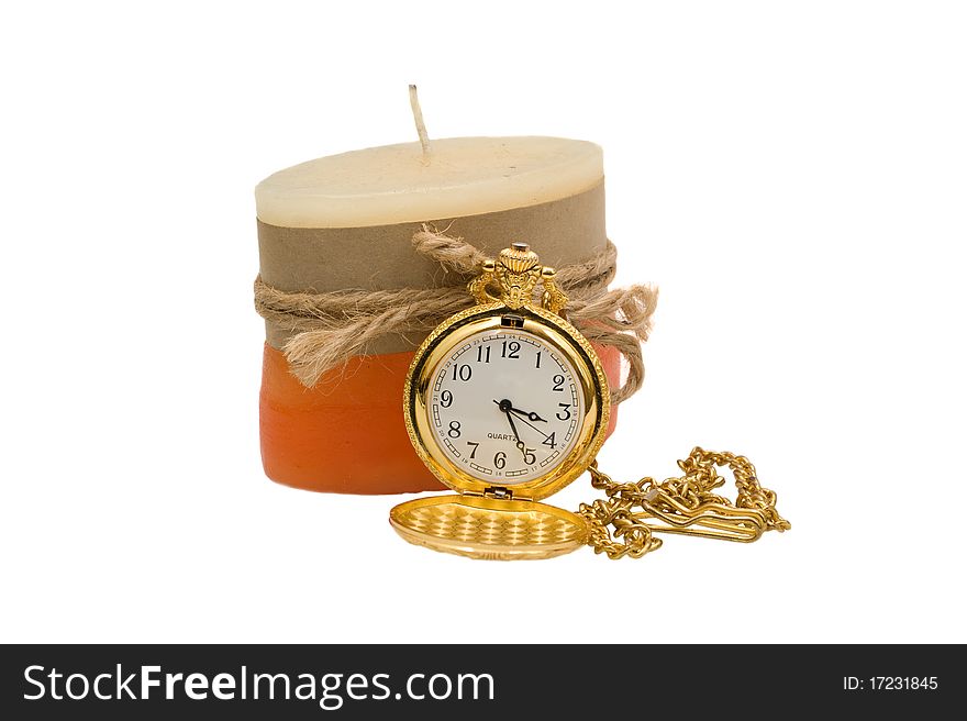 Pocket watches are some of the yellow metal with a candle on a white background. Pocket watches are some of the yellow metal with a candle on a white background