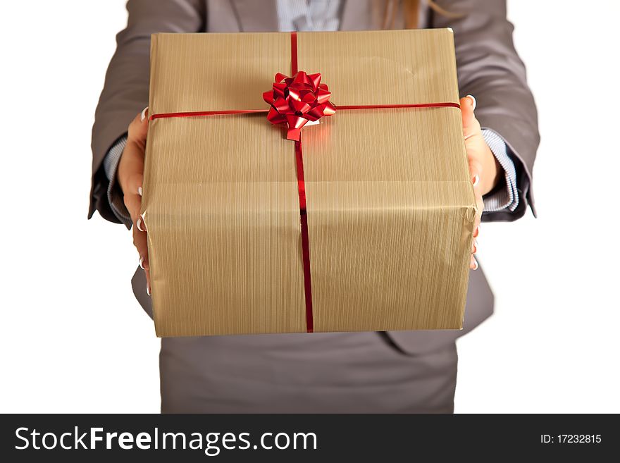 Woman hand holding christmas present on white background